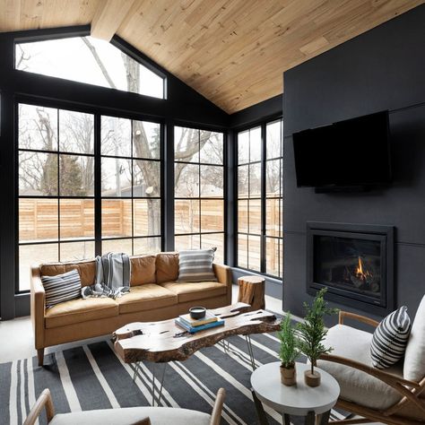 75 Sunroom Ideas You'll Love - July, 2023 | Houzz Jkath Design, Benjamin Moore Wrought Iron, Sleek Fireplace, Four Seasons Room, Sunroom Decorating, Sunroom Designs, Open Dining Room, Screen Porch, Room Additions