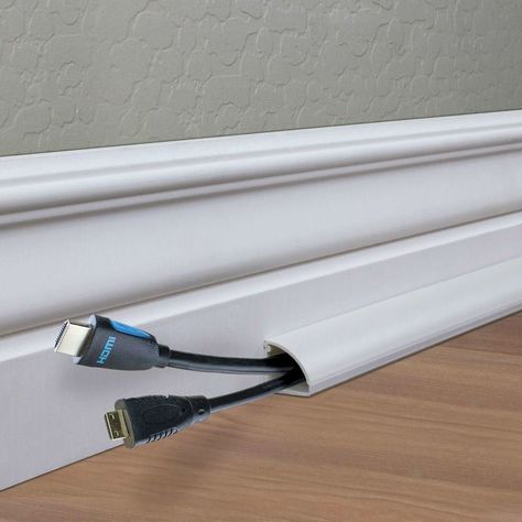 8 Tips for How to Hide TV Wires and Other Cords - Bob Vila Hide Tv Cable, Film Decor, Easy Home Improvement, Hidden Tv, Bob Vila, Narrow Hallway, Diy Interior, Cable Tv, Decoration Inspiration