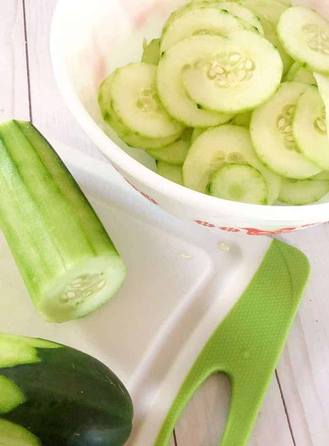 Cucumbers and onions marinated in a white vinegar dressing are a tangy, cool and refreshing side dish salad you'll enjoy all summer long! #cucumbers #sidedish #summerpotluck Freezing Cucumbers, Side Dish Salad, Marinated Cucumbers, Summer Potluck, Summer Side Dish, Cucumbers And Onions, Vinegar Uses, Vinegar Dressing, Cucumber Recipes