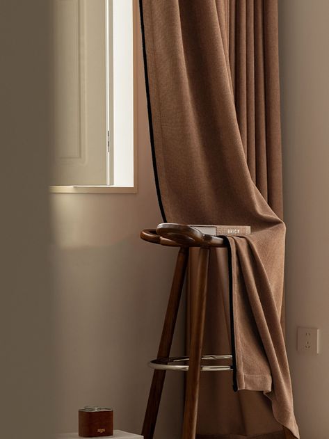 Transform your living space with the Madigan Blackout Curtain, featuring an exquisite black trim that adds a touch of elegance and sophistication. Made from the same high-quality fabric as our Madry collection, this curtain boasts a luxurious faux linen texture and a thick, heavy fabric that is soft to the touch. The standout black edging on both sides enhances its aesthetic appeal, while its light-blocking capability of 80-90% ensures a peaceful, darkened environment, perfect for restful sleep Japandi Bedroom Curtains, Bedroom Linen Curtains, Earthy Curtains, Light Brown Curtains, Brown Curtains Bedroom, Curtains Aesthetic, Linen Curtains Living Room, Curtain Aesthetic, Cavern Clay