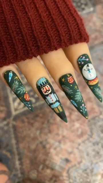 LUXAPOLISH ® LUXA ® on Instagram: "‘Tis the season for nutcrackers, snow globes, & Xmas nail art🎄✨ Cute & festive set by @nailedbycleo using ALL Luxa products🤩 🤍SAVE & SHARE this post with a friend to spread the nail inspo! #luxapolish #luxa #christmasnails #holidaynails #nailinspo #winternails #nails2inspire #nailspro #nailfeed #nailaddict #nailporn #nailgame" Crazy Xmas Nails, Detailed Christmas Nails, Nutcracker Christmas Nails, Nutcracker Nails Designs, Yule Nail Art, Nutcracker Nail Art, Disney Christmas Nail Art, Snowglobe Nails, Crazy Christmas Nails