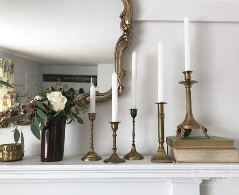 Candlesticks On Fireplace Mantle, Brass Candlesticks On Mantle, Brass Candlesticks Mantle, Candlesticks On Mantle, Brass Candlesticks Decor, Brass Artwork, Faux Mantel, Sideboard Styling, Brass Home Decor