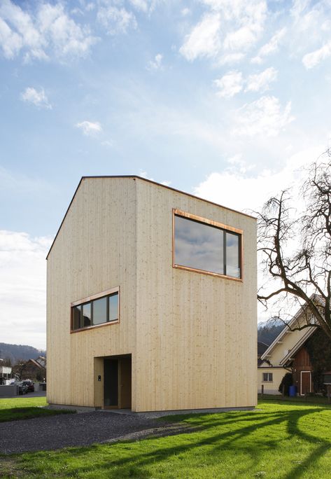 Having inherited a small building plot in the town of Feldkirch close to the Swiss border, a young woman demand for a home that would perfectly fit her individual needs, without exceeding the extremely tight budget. B... Bernardo Bader, Swiss House, Feldkirch, Small Building, Small Buildings, Pitched Roof, Window Frame, Architectural Inspiration, Urban Design