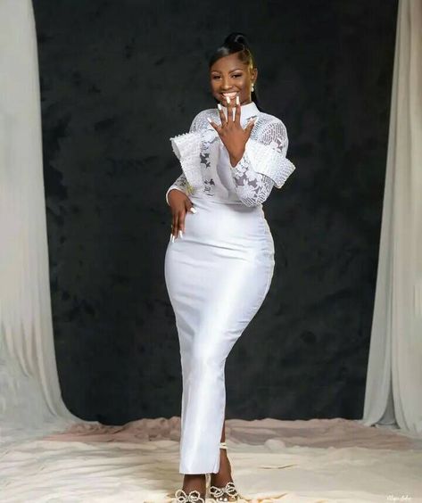 Court Wedding Outfit The Bride Nigeria, White Ankara Dress African Style, White Dress For Church, Court Wedding Dress, Bridal Shower Bride Outfit, Dress For Chubby Ladies, Shower Dress For Bride, White Lace Prom Dress, Dress For Chubby