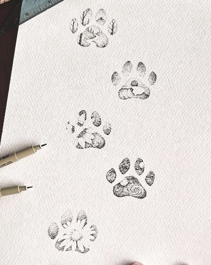 Mandala Paw Print, Dog Paw Tattoo Placement, Dog Pawprint Tattoo Ideas, Cockapoo Tattoo Ideas, Dainty Paw Print Tattoo, Dog Passing Tattoo, Daisy Dog Tattoo, Fine Line Pet Tattoo, Memorial Dog Tattoos Ideas