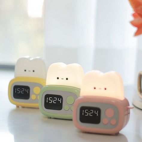 Alarm Clock Desk AlarmClock LED Display Alarm Clock Toaster Design Night Light DESCRIPTION Features: 1. Novel Toaster Design Night Light: The child-friendly kawaii night light is shaped like a toaster, with cute and fashionable style and high-end quality. Soothing light, sweet light, one-click to turn the light on and off, long press to dim, double-click to delay bedtime, the gentle light is not harmful to the eyes, and children can use it easily. It is a good helper for children's lighting. 2. Time Management Tool: This new toaster light features a digital timer with a larger screen and clearly labeled buttons for ease of use. It can count up and down. Whether you're boiling eggs in the kitchen or want to set a timer for your kids' homework, this portable timer is super convenient. This t Boiling Eggs, Cute Alarm Clock, Kids Homework, Time Management Tools, Cute Furniture, Childrens Lighting, Timer Clock, Preppy Stuff, Room Redesign