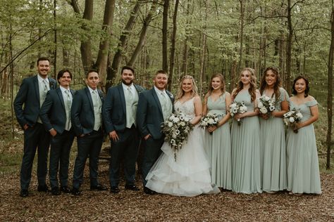 Sage Green Dresses With Groomsmen, Dusty Blue And Sage Green Wedding Suits, Navy And Sage Suit Wedding, Dusty Blue And Sage Green Wedding Party, Dark Green Groom Suit Bridesmaid Dresses, Sage Green Groom Suit, Sage Green Wedding Groomsmen, Sage Bridesmaid Dresses With Groomsmen, Sage Green Groomsmen Attire