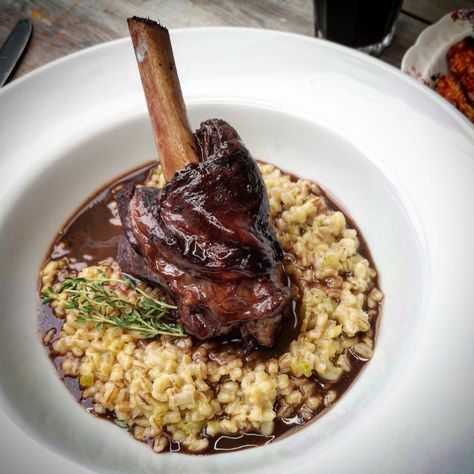 Lamb Shanks Braised in Red Wine with Pearl Barley Risotto - Hepburns Food - Butchers and Fine Foods in Essex Lamb Red Wine Sauce, Lamb Shank With Orzo, Braised Lamb Shanks Dutch Ovens, Lamb Tomato Bredie, Wine Braised Lamb Shanks, Wine Marinade, Red Wine Gravy, Barley Risotto, Braised Lamb Shanks