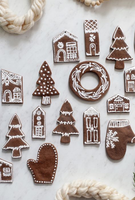 Learn how to make gingerbread salt dough ornaments with this simple recipe! Handmade Salt Dough Ornaments, Salt Dough Ornaments Gingerbread, Diy Christmas Ornaments Salt Dough, Decorating Salt Dough Ornaments, Salt Dough Snowflake Ornaments, Christmas Crafts Saltdough, Salt Dough House, Homemade Salt Dough Ornaments, Gingerbread Dough Ornaments