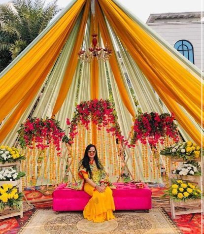 Mehndi Decor Trend - Bridal Seats & Bridal Backdrops for 2021 Weddings Mehendi Backdrop, Decor Ideas Birthday, Haldi Decoration Ideas, Small Wedding Decor, Mehendi Decor Ideas, Bridal Backdrops, Wedding Decor Photos, Wedding Background Decoration, Wedding Entrance Decor