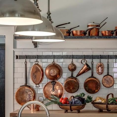 Brad Stanwick on Instagram: "A shot of our kitchen, showing my copper pot collection - as seen during the @homeworthy video!" Copper Pans Hanging In Kitchen, Copper Pot Display, Copper Pans Hanging, Copper Pots Display, Apartment Manifestation, Copper Pans, Copper Pots, Yellow Kitchen, Future Apartment