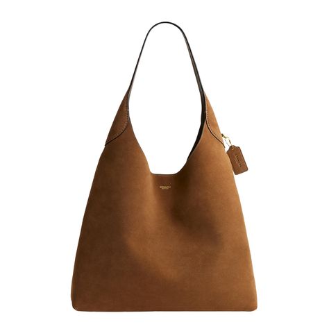 PRICES MAY VARY. Editor's Notes: Our Brooklyn is an elegant, minimalist silhouette—with a distinctly New York attitude. Larger than the 28, this larger hobo bag for women is crafted of velvety suede with beautiful texture and soft feel Velvety Suede: This women's shoulder bag is crafted of a luxe velvety suede - for the perfect statement Coach bag Spacious Interior: This generously sized womens shoulder bag features a spacious interior with room for a 15” laptop and a snap pocket for access to e Elegant Brown Hobo Bag With Suede Lining, Elegant Suede Lined Hobo Shoulder Bag, Luxury Brown Suede Hobo Bag, Brown Bucket-shaped Hobo Bag, Brown Suede-lined Hobo Shoulder Bag, Coach Hobo Bag, Coach Hobo, Large Hobo Bag, Minimalist Silhouette