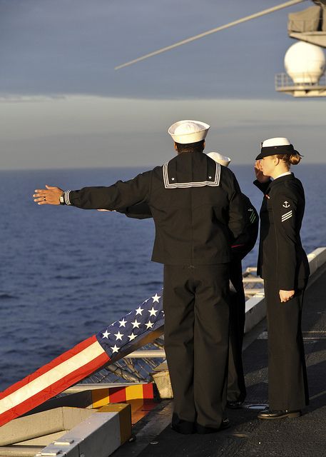 PACIFIC OCEAN (Nov. 16, 2012) Sailors perform a burial at sea held on board the aircraft carrier USS Nimitz (CVN 68). Nimitz recently completed the ship’s Joint Task Force Exercise (JTFEX). JTFEX is designed to test a strike group’s ability to operate in hostile and complex environments with other U.S. and coalition forces. (U.S. Navy photo by Mass Communication Specialist 3rd Class Ryan J. Mayes/Released) Navy Hospital Corpsman, Communication Specialist, American Military History, Uss Nimitz, Navy Day, Navy Life, Ship Anchor, Workwear Vintage, Navy Mom