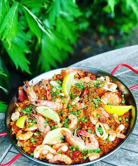 Oven baked Paella ⠀ ⠀ Take yourself to Spain 🇪🇸 with this simple yet delicious paella dish. I find stirring on top of the hob a total bore,… Baked Paella Recipe, Raw Prawns, Seafood Bake, Paella Pan, Seafood Paella, Paella Recipe, Large Oven, Fish Stock, Oven Dishes