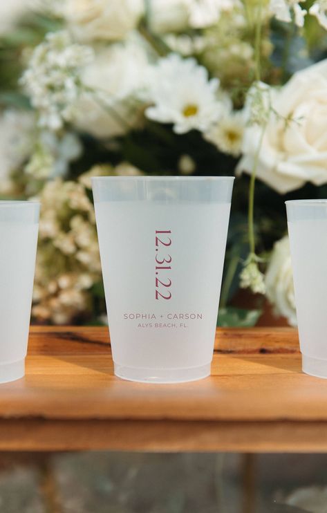 Personalized shatterproof flex cups are a must for special events! Our personalized plastic cups will add the perfect touch to your next event! Choose from our selection of cup sizes and ink color options to customize these cups to fit your event colors. We suggest ordering 1 cup per guest for each hour of your event.  ---------------- TO ORDER: ---------------- 1. Choose your quantity 2. Choose your cup size. 3. Info box - Include ink color choice, names, wedding date & location in the information box (or any changes you want to be made to the text) & the desired date cups are needed. ------------------------------------- PRODUCTION & SHIPPING: ------------------------------------- A proof will be provided of your design before it is put into production, usually within 48 hours.  Please a Frosted Plastic Cups, Wedding Drink Cups, Cup Personalization Ideas, Personalized Plastic Cups For Wedding, Wedding Party Cups, Wedding Favor Cups, Wedding Cup Ideas, Custom Wedding Ideas, Wedding Cups For Guests