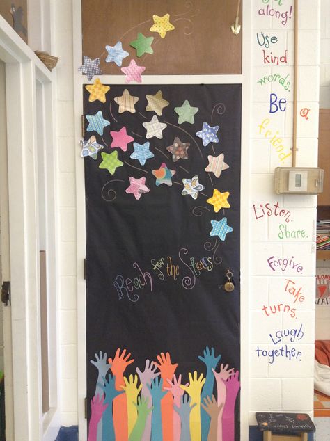 Reach for the stars door. Trace and use students hand for the bottom. Love this!! Stars Door Decorations Classroom, Star Classroom Decorations, Reach For The Stars Door Decoration, Star Classroom Door Ideas, Classroom Star Theme, Star Classroom Decor, Stars Classroom Door, Star Of The Month Board Ideas, Star Bulletin Board Ideas