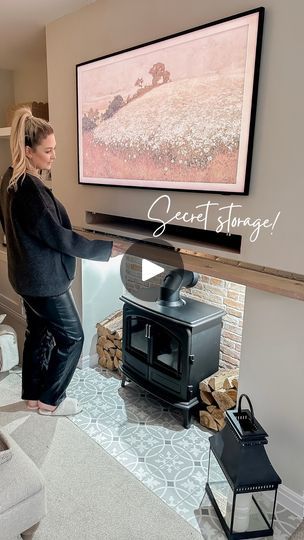 778K views · 12K reactions | Our beam is hiding a secret… 🤭😆

A super handy idea to add to your media wall for some extra storage or as a spot to have your TV box to hide those pesky wires! 

We also had to create our own beam as we struggled to buy one long enough… so this is just a piece of basic timber finished in @neptunehomeofficial isoguard! A great way to save some money without comprising on the look 🥰

Be sure to save for inspo if you’re thinking of creating your own media wall! 🤍🤍

TV - @samsungtv the frame 
Wall colour - @duluxuk Egyptian cotton 
Fireplace - @dimplexfires optimyst 
Brick slips - @candwberry 
Heart tiles - @porcelainsuperstore 
Sofas - @marksandspencer Rochester range 
.
.
.
#livingroom #mediawall #mediawalldesign #mediawallideas #livingroomideas #fireplaced Media Wall Colour Ideas, Tv Wire Hiding Ideas, Frame Tv Over Fireplace, Tv Feature Wall, Brick Slips, Hidden Spaces, Hide Wires, Wall Colour, General Ideas