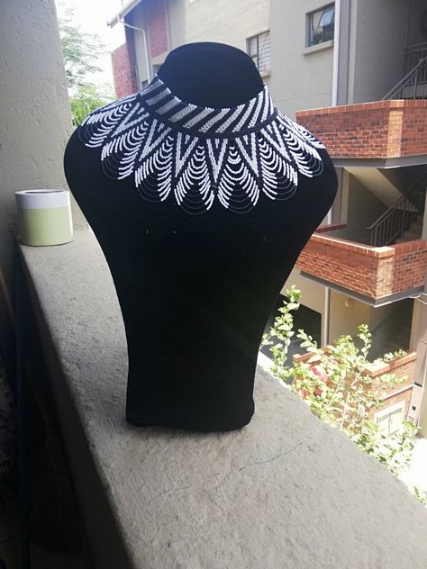 A must have Black and white necklace. Also available in gold and black. Suitable for all neck sizes. Xhosa Jewellery, Masai Beadwork, Avatar Clothing, African Print Shoes, Beaded Necklace Black, Black And White Necklace, Fashion Collection Inspiration, African Beads Necklace, Necklace With Beads