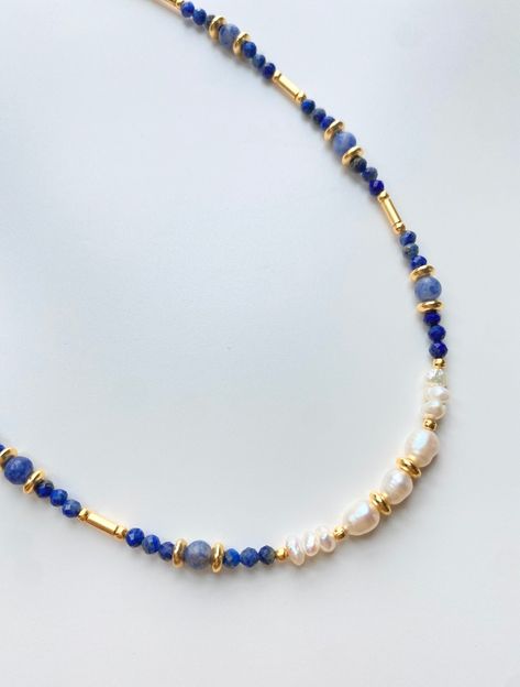 Lapis Lazuli Necklace with Baroque Pearls, Pearl Choker, Real Pearl Necklace with Sodalite, Beaded Necklace y2k, Gift for Mom, y2k Jewelry, Raw Gemstone Necklace, Plus Size Choker, Raw Crystal Necklace with Fresh Water Pearls, y2k Necklace ♥ Useful Quick Notes * This colorful crystal necklace is prepared with gold-plated beads, blue Lapis Lazuli crystal beads, big blue Sodalite crystal beads and fresh water pearls. * The finish is also made with a gold-plated chain and a gold-plated lobster claw Lapis Lazuli Beaded Necklace, Gold And Blue Jewelry, Blue Pearl Necklace, Mixed Beads Necklace, Necklace Y2k, Y2k Necklace, Fancy Jewelry Necklace, Real Pearl Necklace, Lapis Necklace