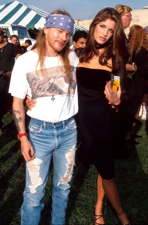 The '90s supermodel starred in two Gun's N' Roses music videos, and had a notoriously tumultuous relationship with the brand's lead vocalist that lasted for two years.   - HarpersBAZAAR.com Stephanie Seymour Axl Rose, Cindy Crawford Photo, 90s Couples, Axel Rose, Duff Mckagan, November Rain, Stephanie Seymour, Toni Garrn, Lauren Hutton