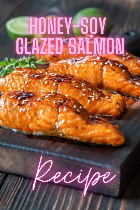 Indulge in the deliciousness of Honey-Soy Glazed Salmon! This recipe features tender salmon fillets coated in a mouthwatering glaze made with honey, soy sauce, lemon juice, garlic, ginger, and more. Simply bake until perfectly cooked and garnish with sesame seeds and green onions. Serve it hot with your favorite sides for a satisfying meal. Easy to make and bursting with flavor! #salmonrecipe #honeysoyglaze #easydinnerideas Soy Glazed Salmon, Salmon Glaze Recipes, Honey Sesame, Honey Soy, Glazed Salmon, The Hive, Salmon Recipe, Salmon Fillets, Satisfying Food