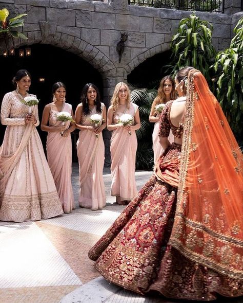 A Complete Guide To Desi Bridesmaid Duties & Tasks - Eternity UK Rust Indian Bridal Outfit, South Asian Bridesmaid Dresses, First Look Indian Wedding, Indian Bridal Party Outfits, Indian Bride And Bridesmaids, Bengali Bridesmaid, Hindu Wedding Bridesmaids, Indian Bridesmaids Saree, Indian Wedding Bridesmaids Outfits