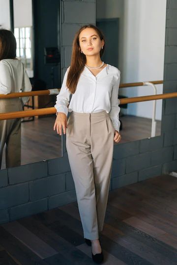 Premium Photo | Vertical portrait of elegance confident young woman wearing stylish clothes looking at camera standing in room with mirror pretty successful female teacher posing in art classroom Female Teacher Outfits, Teacher Pose, Room With Mirror, Fire Costume, Female Teacher, Stylish Clothes, Teacher Outfits, Yellow Sweater, Human Nature