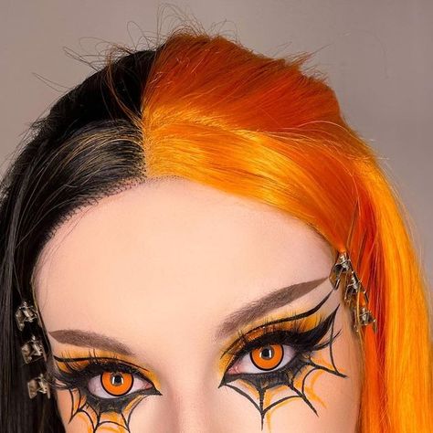 Leah Sapp on Instagram: "Some pics of the spider web look I posted a tutorial on the other day! I always say I wish my real eye color was red but now orange might be a close second fave 😫 . Makeup details- Eyes: @aboutfacebeauty matte fluid eye paints in spectre and art of darkness, liner in into the void @bellabeautebar best mattes palette @kaima_cosmetics loose pigment in buttercup @nyxcosmetics epic ink liner and glitter glue @glisten_cosmetics wet liner in carrot cake @benefitcosmetics gim Spider Liner Makeup, Halloween Spider Makeup Ideas, Spider Man Makeup Women Eye, Halloween Inspired Eye Makeup, Halloween Inspired Eyeshadow, Halloween Makeup Cute Simple, Spider Web Face Makeup, Orange Halloween Makeup Looks, Red Liner Makeup Looks