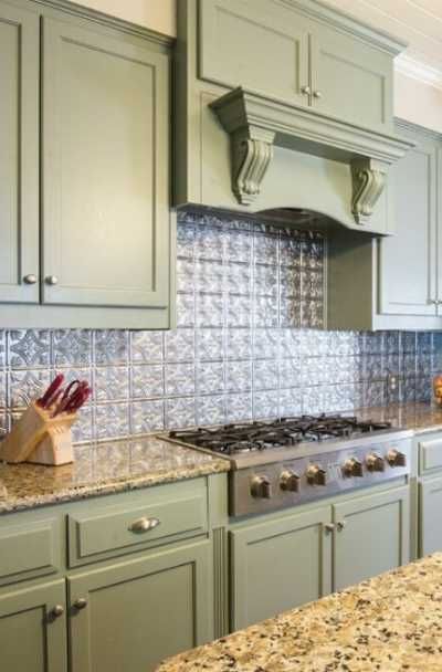 23 Tin Backsplash Design Ideas for Your Kitchen | Sebring Design Build Tin Tile Backsplash Kitchen, Granite Kitchen Backsplash, Kitchen Backsplash On A Budget, Backsplash On A Budget, Kitchen Backsplash Ideas Farmhouse, Tin Tile Backsplash, Metal Backsplash Kitchen, Farmhouse Kitchen Backsplash Ideas, Tin Backsplash Kitchen