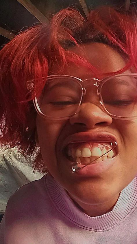 Person with red hair in saturated lighting with safety pins stuck through the the skin in their mouth above their teeth Smiley Piercing With Braces, Cute Nose Piercings, Smiley Piercing, Nose Piercings, Recipes Christmas, Cookies Recipes, Cookies Recipes Christmas, Nose Piercing, Christmas Food