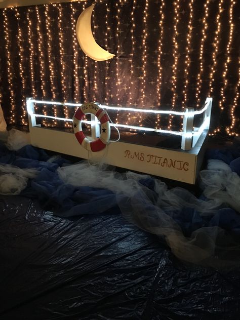 Cruise Ship Themed Party Ideas, Titanic Photo Booth, Cruise Ship Set Design, Sailing Theme Birthday Party, Titanic Tea Party, Shipwrecked Prom Theme, Cruise Ship Party Ideas, Cruise Ship Centerpiece Ideas, Titanic Themed Party Decoration