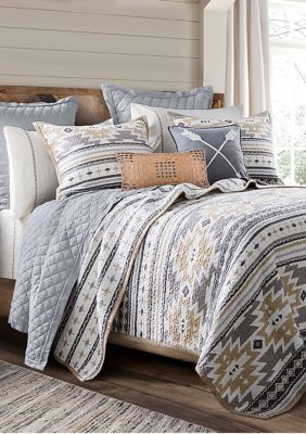 For a soft modern take on southwestern style, the desert sage presents a cool gray Aztec inspired pattern. The quilting and geometric pattern provide texture and design that can be layered for added warmth and style. Enhance the look with light pillow accents like our genuine leather pillows for an extra flourish. Material: Face: 100% Cotton. Back: 100% Cotton. Filling: 100% Polyester. Care: Machine wash cold, gentle cycle only. Non-chlorine bleach when needed. Tumble dry low. Iron at lowest set Sage Quilt, Aztec Bedding, Southwestern Bedding, Bed Quilts, Western Bedroom Decor, Western Bedding, Western Bedroom, Reversible Bedding, Cotton Quilt Set