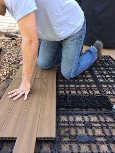 Deck Over Concrete, Diy Concrete Patio, Velvet Chesterfield, Concrete Patio Makeover, Velvet Sofas, Laying Decking, Deck Flooring, Cement Patio, Concrete Patios