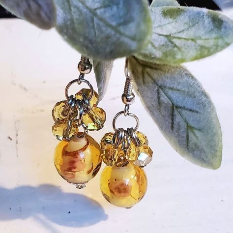 Amber Orange Murano Glass Flower Czech Crystal Bead Cluster Handcrafted Earrings Material: Silver Plated Brass Metal, Vintage Murano Glass Flower Inside Beads, Vintage Czech Crystal Rondelle Beads Color: Silver Pink Clear Amber Orange Size (Average/Approximate): 44mm Long X 13mm Wide Shape: Round Quantity: 1 Pair Pd 1589 Woodland Earrings, Baublebar Earrings, Starfish Earrings, Earrings Handmade Dangle, Mini Earrings, Holiday Earring, Czech Crystal, Round Stud Earrings, Handcrafted Earrings