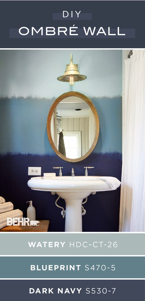 Refresh your bathroom walls with a fun and easy interior design trend. This DIY ombre painted wall uses Watery, Blueprint, and Dark Navy, from the Behr 2019 Color Trends collection, to create a unique design. Use traditional white trim and glamorous pops of gold to complete this look. Find the project tutorial by clicking below. Ombre Painted Walls, Bathroom Paint Colors Behr, Behr Color Trends, Modern Paint Colors, Behr Colors, Ombre Wall, Trending Paint Colors, Behr Paint, Bathroom Paint Colors