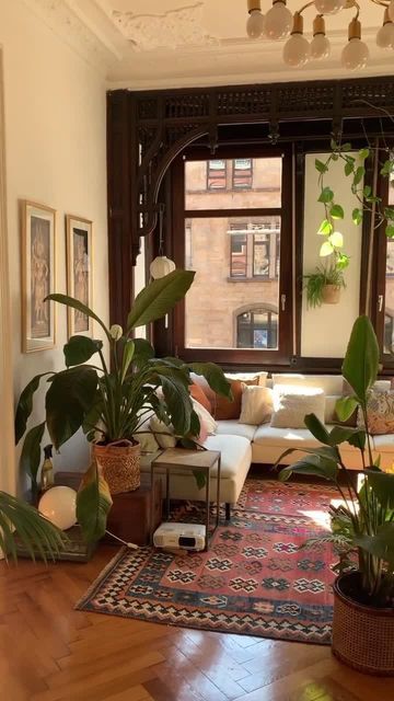 Apartment Therapy on Instagram: "Plants + sun 💚 via @tinchenwaldkindlissi" Vintage Living Room Design, Mediterranean Apartment, Spanish Apartment, Earthy Living Room, Apartment Aesthetic, Vintage Living Room, Studio Mcgee, Apartment Inspiration, Living Room Inspo