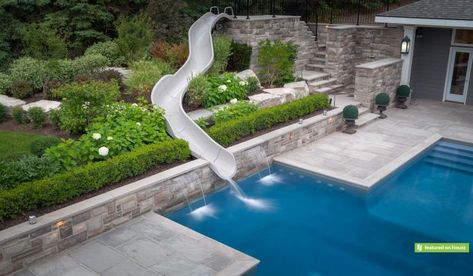 95 Stunning Pool Designs and Ideas To Inspire Your Next Project Pools With Slides And Waterfalls, Built In Pool Slide, Modern Pool With Slide And Waterfall, Pools Built Into Hillside, Pool Built Into Hillside, Backyard Waterslide, Pool With Waterslide, Pool Waterslide, Pool With Slide