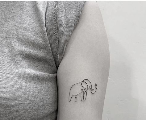 Elephant Strength Tattoo, Fine Line Africa Tattoo, Simplistic Elephant Tattoo, Small Elephant Tattoos For Women, Elephant Tattoo Fine Line, Elephant Holding Flower Tattoo, Africa Inspired Tattoos, Minimalist Tattoo Elephant, Elephant Fine Line Tattoo