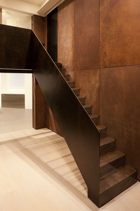 A former post office reimagined. See the Copper Stairwells via Decorating with Copper on the Spruce + Furn Blog. Image Source: dezeen.com Metal Facade, Interior Staircase, Minimalist Flat, Copper Decor, Stair Case, Stair Handrail, Interior Stairs, Copper Wall, Yacht Design