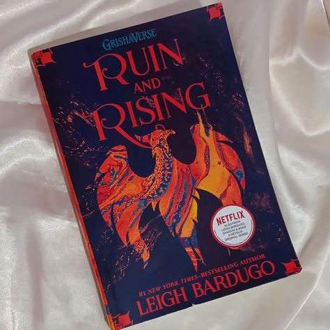 Book Review: Ruin and Rising by Leigh Bardugo. ⭐️⭐️⭐️⭐️⭐️/5 The third instalment in Leigh Bardugo's Grisha Trilogy, exceeded my expectations and left a lasting impression, earning a rare 5-star rating from me This final book is not only better written than its predecessors but also takes the series in an unexpected and compelling direction, particularly following the cliffhanger at the end of the second book. The narrative picks up with Alina Starkov grappling with the aftermath of her previ... Ruin And Rising, Alina Starkov, Grisha Trilogy, Netflix Original Series, Book Board, Leigh Bardugo, The Aftermath, Grappling, Star Rating