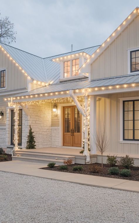 Modern Farmhouse Chimney Exterior, White Farmhouse Christmas Decor Exterior, Exterior House Upgrades, Modern Farmhouse Exterior Christmas Decor, White Christmas Lights Outdoor House, Farmhouse Exterior Christmas Lights, Farmhouse Porch Christmas Lights, Exterior House Christmas Lights, Light Tan House Exterior