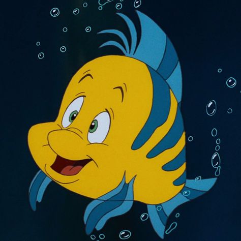 Flounder is a major character in Disney's 1989 animated film The Little Mermaid. He is Ariel's best friend, who regularly embarks on her adventures despite his cowardly demeanor. Though his name would imply otherwise, he is not a flounder, but a tropical fish. Flounder comes from a large family, with numerous siblings. His actual name, according to "The Evil Manta", is Guppy Number 35. His exact age is unknown, but he appears to be younger than Ariel (16) during the events of The Little... Little Mermaid, Ariel, Mermaid, Fish, Yellow, Disney, Water, Blue, Color