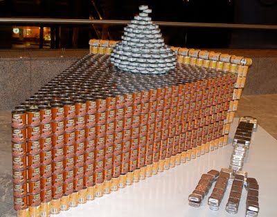 | NYC ♥ NYC: CANstruction 2009: Sculptures Made From Cans of Food at ... Can Sculpture Ideas, Can Sculpture, Canned Food Drive, Beer Display, Souper Bowl, Food Sculpture, Store Window Displays, Canned Goods, Food Drive