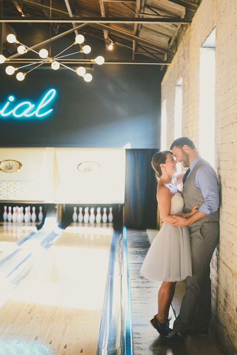 Nashville bowling alley engagement shoot | Photo by Jessie Holloway | Read more - http://www.100layercake.com/blog/?p=79479 Bowling Photoshoot Couple, Engagement Photos Bowling Alley, Bowling Pin Wedding Centerpieces, Bowling Alley Photoshoot Couples, Bowling Alley Wedding Reception, Bowling Engagement Photos, Bowling Wedding Reception, Bowling Alley Engagement Pictures, Bowling Alley Photoshoot