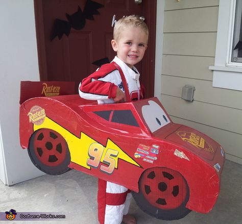 Brittney: This cute Lightning McQueen is our son, Dawson. He so badly wanted to be Lightning McQueen for Halloween but they only had race car driver costumes for that. My husband... Diy Lighting Mcqueen Costume, Lightning Mcqueen Box Car, Lightning Mcqueen Costume Diy, Diy Lightning Mcqueen Costume, Cute Lightning Mcqueen, Race Car Costume, Piñata Cars, Mcqueen Costume, Cars Halloween Costume