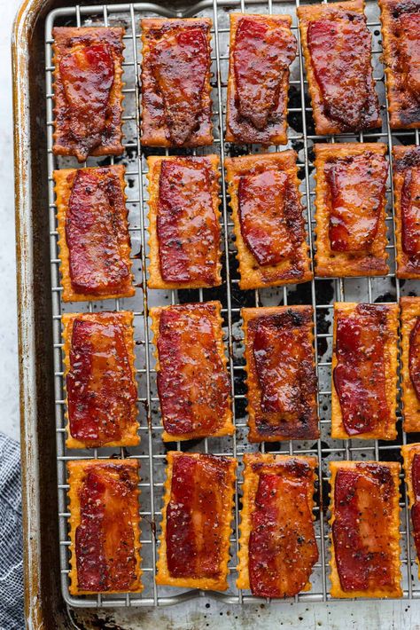 Introducing the easiest and tastiest appetizer that every party needs! Bacon crackers start with a buttery cracker layered with salty bacon and sprinkled with brown sugar and black pepper. It only takes 4 ingredients to make this sweet and salty snack. Candied Bacon Crackers, Bacon Crackers, Spicy Crackers, Bacon Cracker, Bacon Wrapped Appetizers, Brown Sugar Bacon, Crackers Recipe, Bacon Appetizers, The Recipe Critic