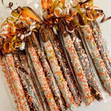 Pumpkin Dipped Pretzels, Fall Pretzel Sticks, Fall Teacher Treats, Pretzel Fall Treats, Fall Dipped Pretzel Rods, Pretzel Rods Dipped Thanksgiving, Fall Baby Shower Treat Table, Fall Festival Baked Goods, Chocolate Covered Pretzels Thanksgiving