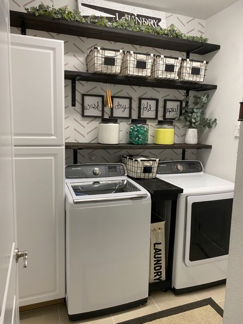 Small Laundry Room Reno, Black Shelves In Laundry Room, Black Accent Wall In Laundry Room, Laundry Room Above Cabinet Decor, Laundry Room With Pantry Cabinets, Laundry Room Colors Scheme Farmhouse, Ways To Hide Washer And Dryer In Kitchen, Rustic Modern Laundry Room, Simple Laundry Room Design