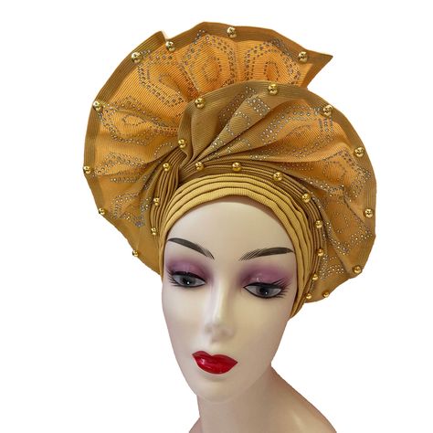 PRICES MAY VARY. 100% Polyester Imported 100% Brand New And High Quality! Luxury Nigerian Gele Headties with Beads and Stones ,Already Made for Traditional Marriage Prayer Cap. Classic Fashion Headbands Turban Cap Style, Women Headwrap Headgear,Beautiful Design ,Solid Color, Looks Good, Prevent Your Head From Gets Cold Size: One size fits most.Adjustable Auto Gele Head Wrap Can Fit Different Head New Arrival Fashion Fan Shape Style Gele,Sego Gele Headties For Engagement/Wedding Note: Due To Diff Sego Gele Styles, Turban Cap Style, Latest Gele Styles, Gele Head Wrap, Nigerian Gele, Simple Dress Styles, Women Headbands, African Headwrap, Wedding Note