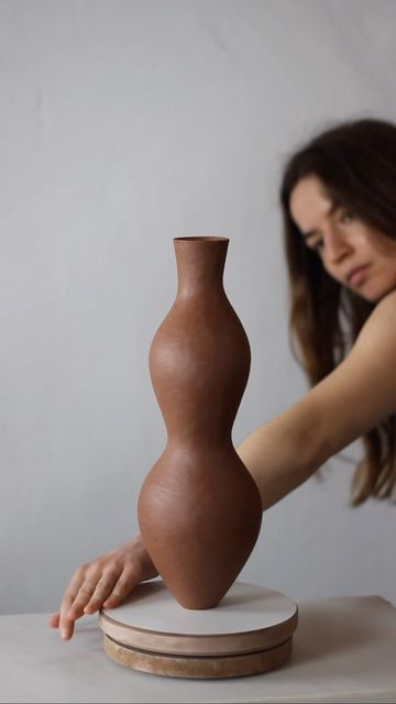 KARINA SMAGULOVA on Instagram: "The permanence of the Women Vessels is grounded in two main forms; a horizontal and a vertical curve, which mark the foundation of all the pieces from the, (now 4 years old) archive. In a world that is constantly changing, before any words have had the chance to form, clay has been a truly cherished friend." Interesting Pottery Shapes, Tall Ceramic Sculpture, Karina Smagulova, Ceramics Throwing, Crazy Ceramics, Art Studio Room, Vase Pottery, Organic Ceramics, Wheel Throwing